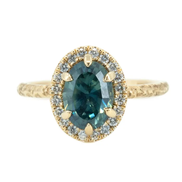 201ct Oval Teal Blue Sapphire and Six Prong Diamond Halo Ring in 14k Yellow Gold Anueva Jewelry Rings 201ct Oval Teal Blue Sapphire and Six Prong Diamond Halo Ring in 14k Yellow Gold Anueva Jewelry Rings
