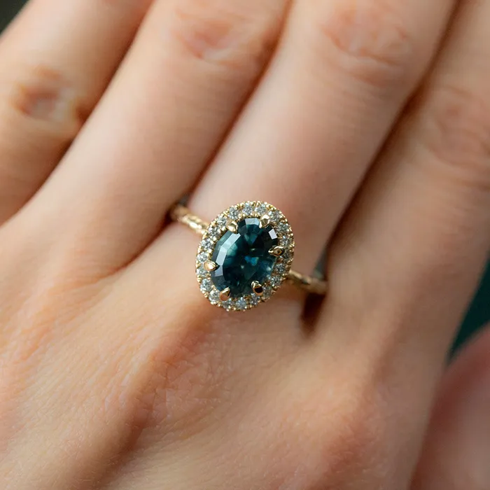 201ct Oval Teal Blue Sapphire and Six Prong Diamond Halo Ring in 14k Yellow Gold Anueva Jewelry Rings