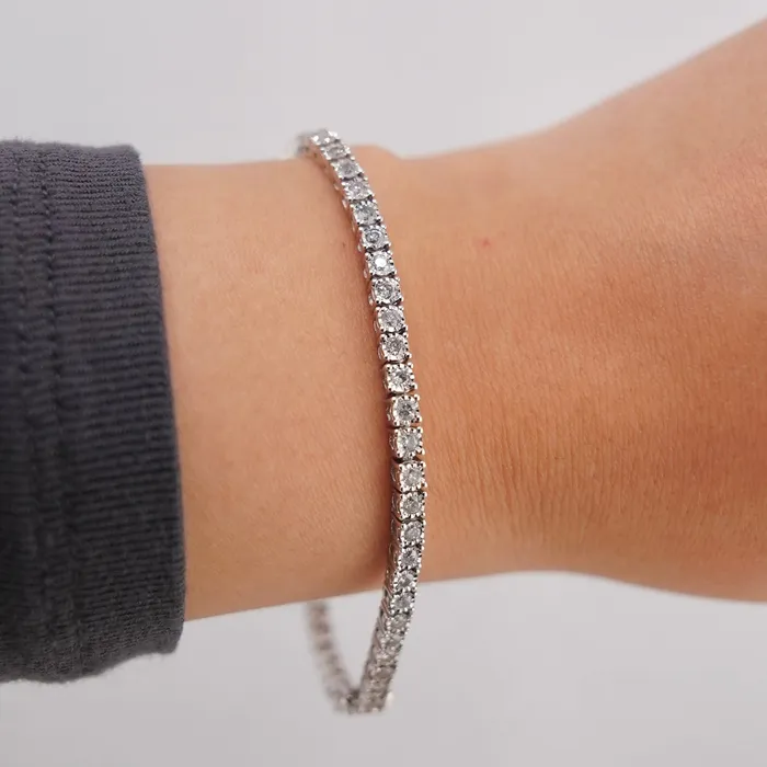 Bracelets AB and J 10k Gold Diamond Illusion Bracelet 7in C736